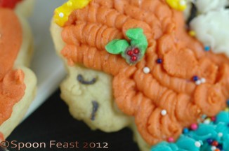 Holly in her hair. . .