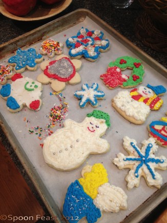 A fun tray of decorated cookies. Decorating on a tray catches all the tiny sugar bits that don't stick to the cookies.