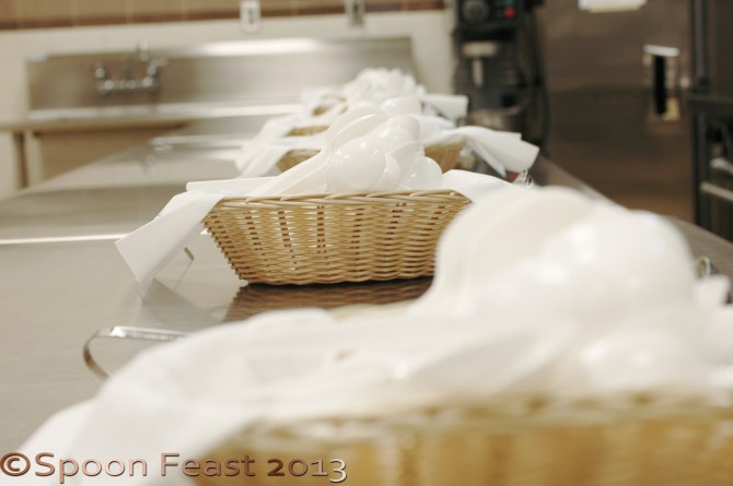 Each basket of spoons marks a spot for a different restaurant