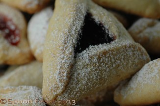  Egg wash the edges, Fold the circles into a triangle;  bake in a 400 F degree oven for 15-20 minutes, until golden brown.