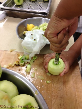 Core the apples, drizzle with lemon juice.