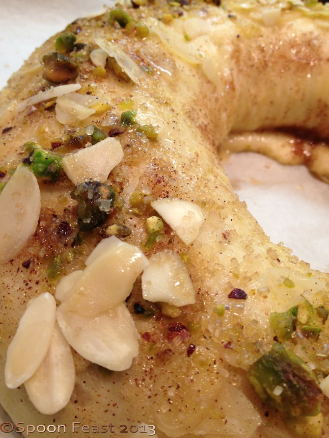 Sprinkle the top with almonds and pistachios