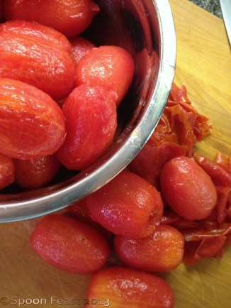 Slip the skins off the tomatoes, cut and squeeze out the seeds.