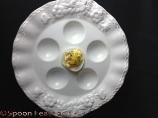 Egg plate with an egg in it, now do you see indents or domes?